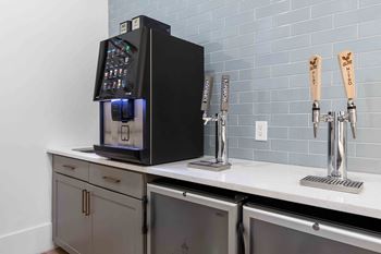 a coffee machine sitting on top of a kitchen counter